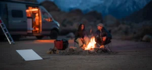 Starlink Mini Gen 4 satellite dish set up next to an RV for high-speed remote internet.